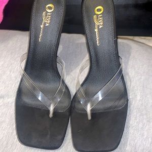 Black high heels with clear strap